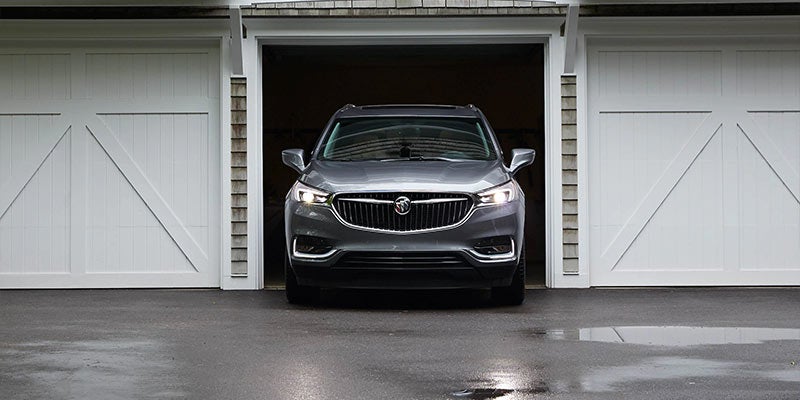 A silver 2021 Buick Enclave backed into a garage. | Buick dealer in St. Louis, MO