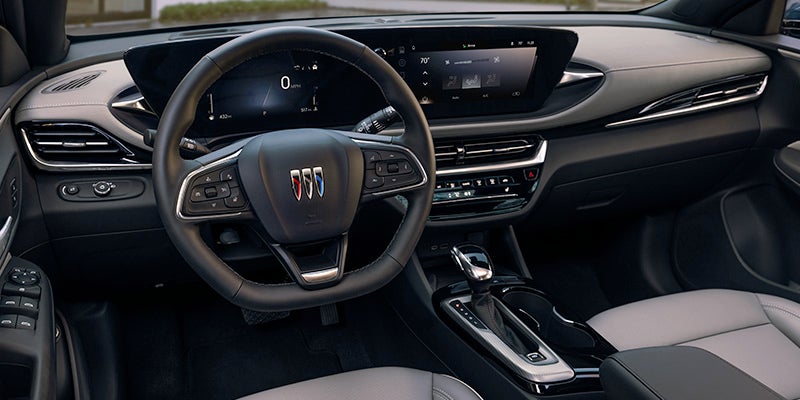 Image of the interior front dashboard of a 2024 Buick Envista (interior color: black)